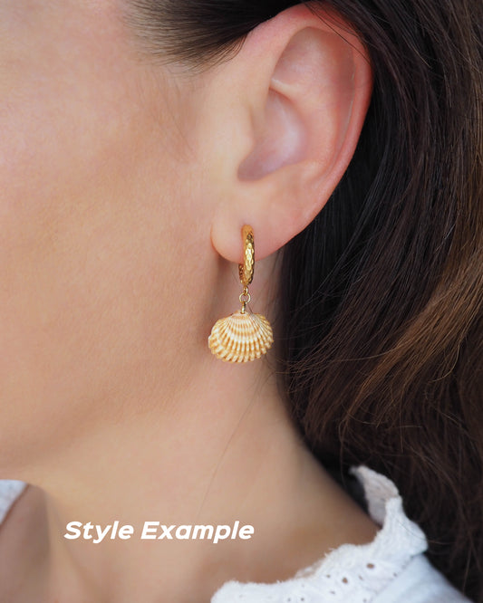 Sunny Cockle Shell earrings in ear model side view