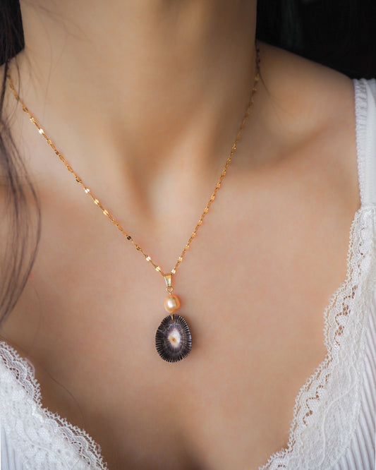 Striped Limpet Shell Pearl Necklace on neck model, Dark Limpet Shell from Portugal with freshwater pearl and gold chain. 