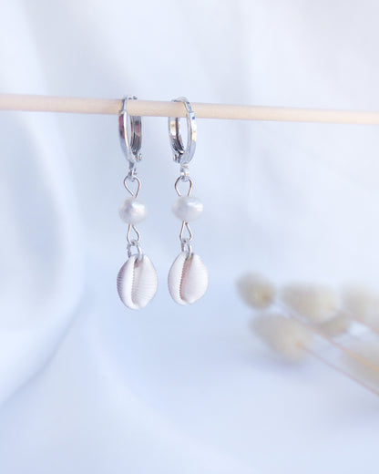 Front view of 925 sterling silver european cowrie shell earrings with freshwater, handpicked trivia monacha shell from portugal, coastal wedding jewelry