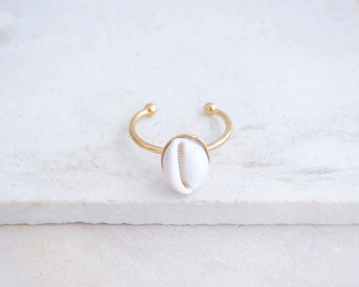 European Cowrie Shell Gold Ring from Portugal on stone display, Handpicked Spotted Cowrie Shell from Portugal, Gold Stainless Steel ring with tiny cowrie shell, Gift for beach girls