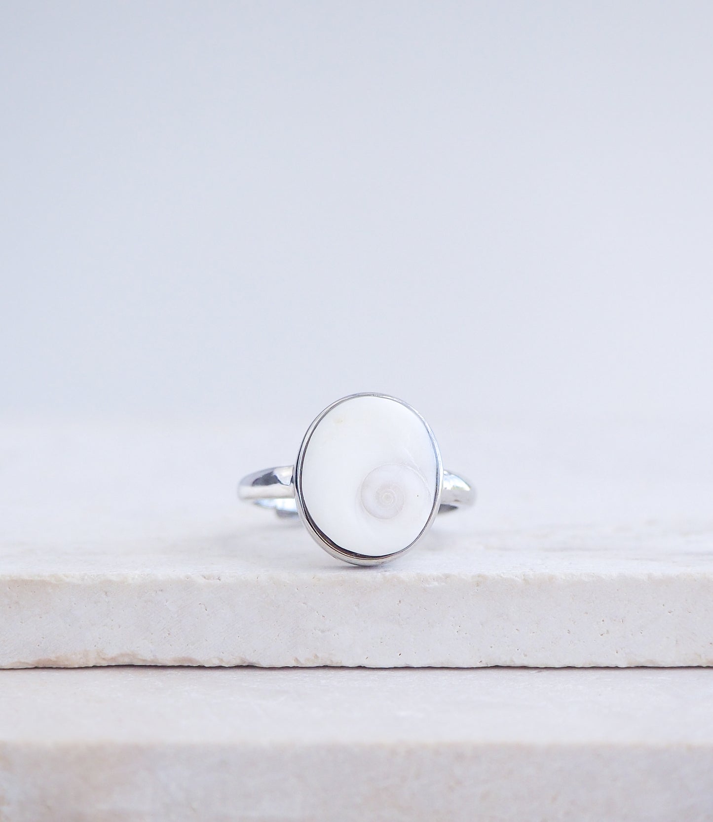 Eye of Saint Lucia 925 Sterling Silver Ring on stone front view