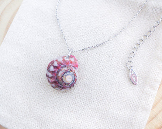 Fuchsia Magus Top Shell Silver Necklace on display