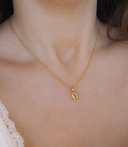 Gold Cowrie Necklace on neck model