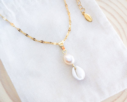 Gold Cowrie Shell Pearl Necklace Champagne Pearl on display front