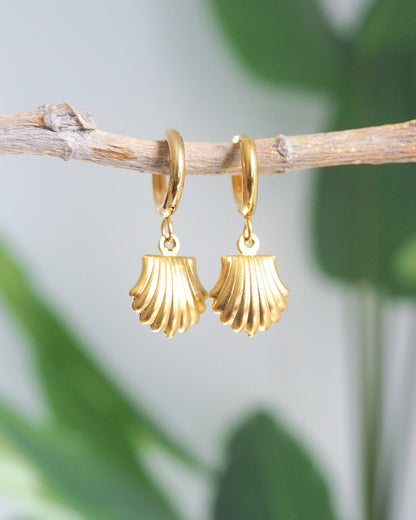 Gold Shell Earrings with green plant background, seashell pendant earrings, waterproof beach jewelry