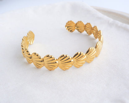 Gold Shell Bracelet on display