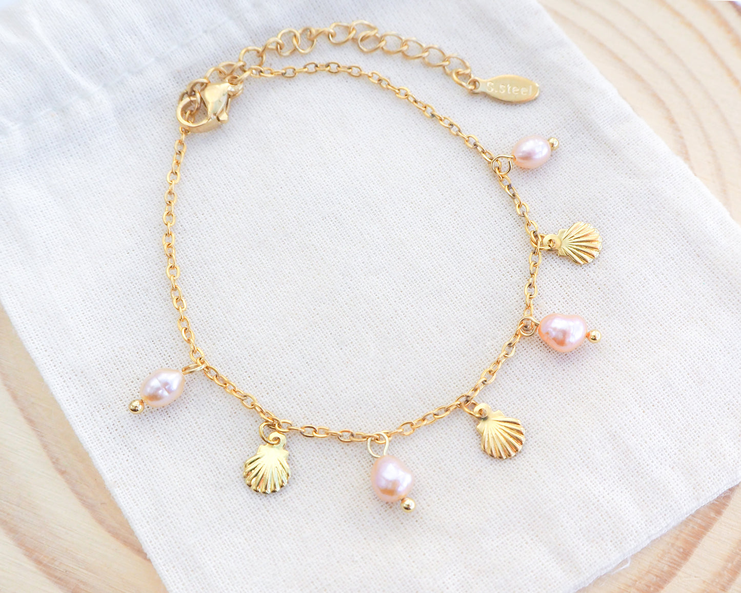 Gold Tiny Shell Rose Pink Freshwater Pearl Bracelet on display, Dainty Gold Shell Bracelet