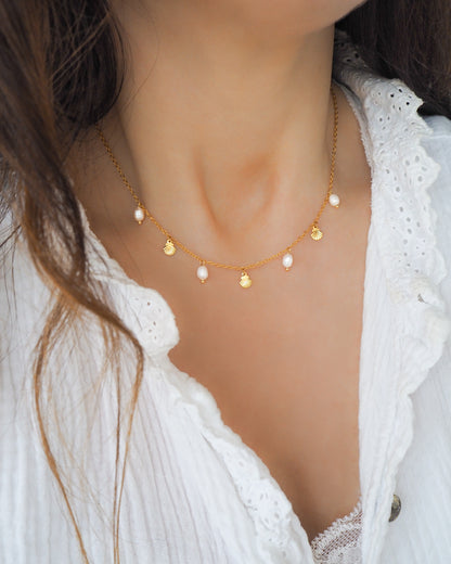 Gold Tiny Shell with Freshwater Pearls on model