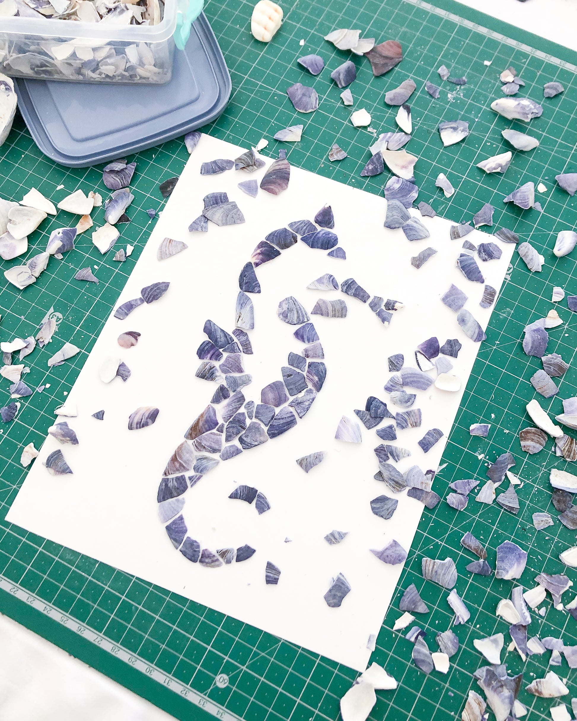 Side view of making of Blue Mussel Mosaic Seahorse Artwork, Seashell Mosaic Hippocampus Coastal Wall Art, Coastal Home Decor, Handmade Seashell Art with Blue Mussel Shells from Portugal