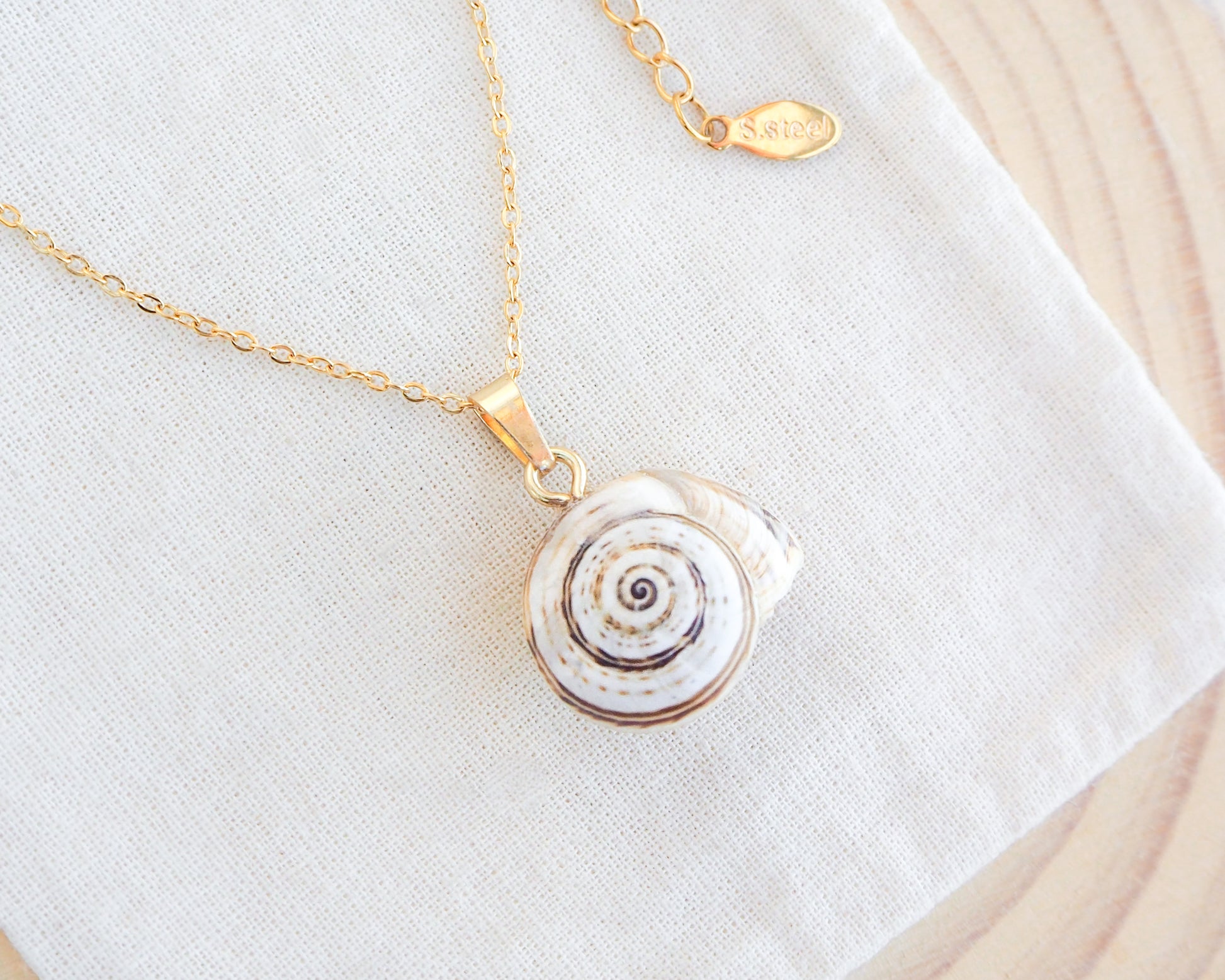 Gold Mediterranean Coastal Snail Necklace, Caracol, Sand Snail on display