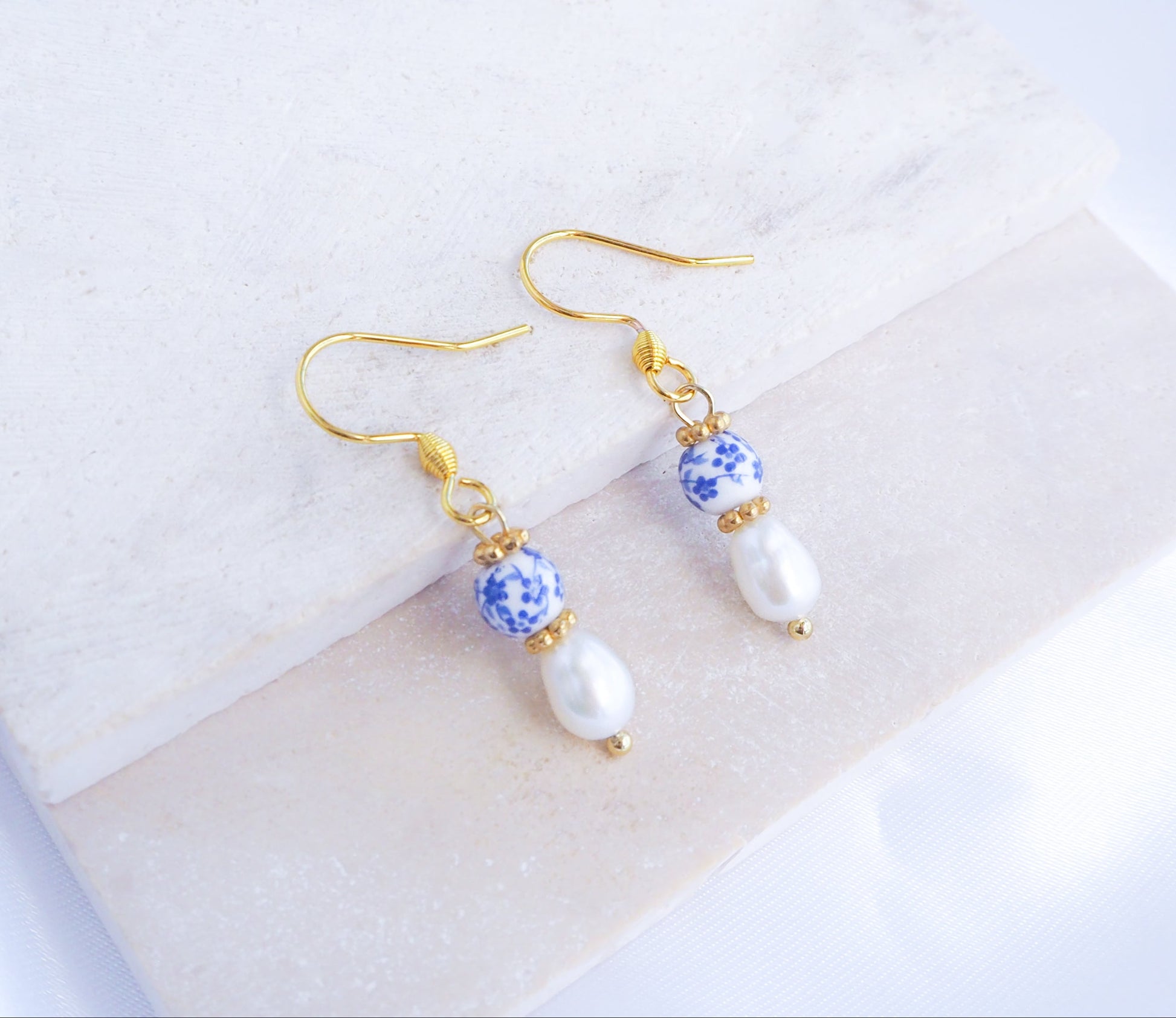 Dainty Portuguese Ceramic Pearl Gold Earrings on display, Mini Azulejo Earrings from Portugal, Portuguese Tlles Jewelry, Blue White Flower Porcelain Earrings