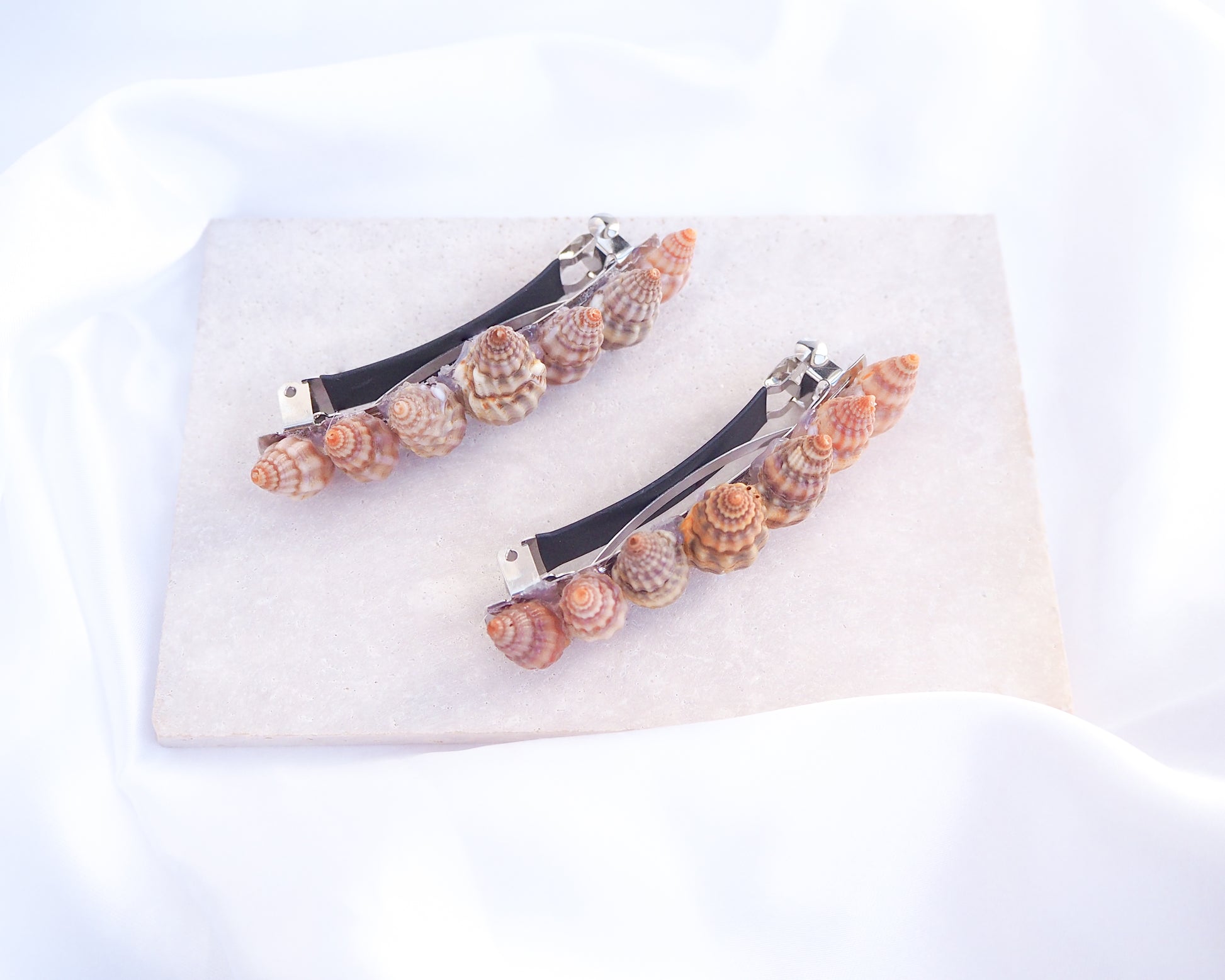 Netted Dog Whelk Shells Hair Clip Barrette on stone displayed, Boho Seashell Beach Clip from Portugal, Handpicked Real Shells, Seashell Hair Decoration, Bohemian Seashell Wedding Hair Assocciares, Coastal Christmas gift, Beach Wedding Hair