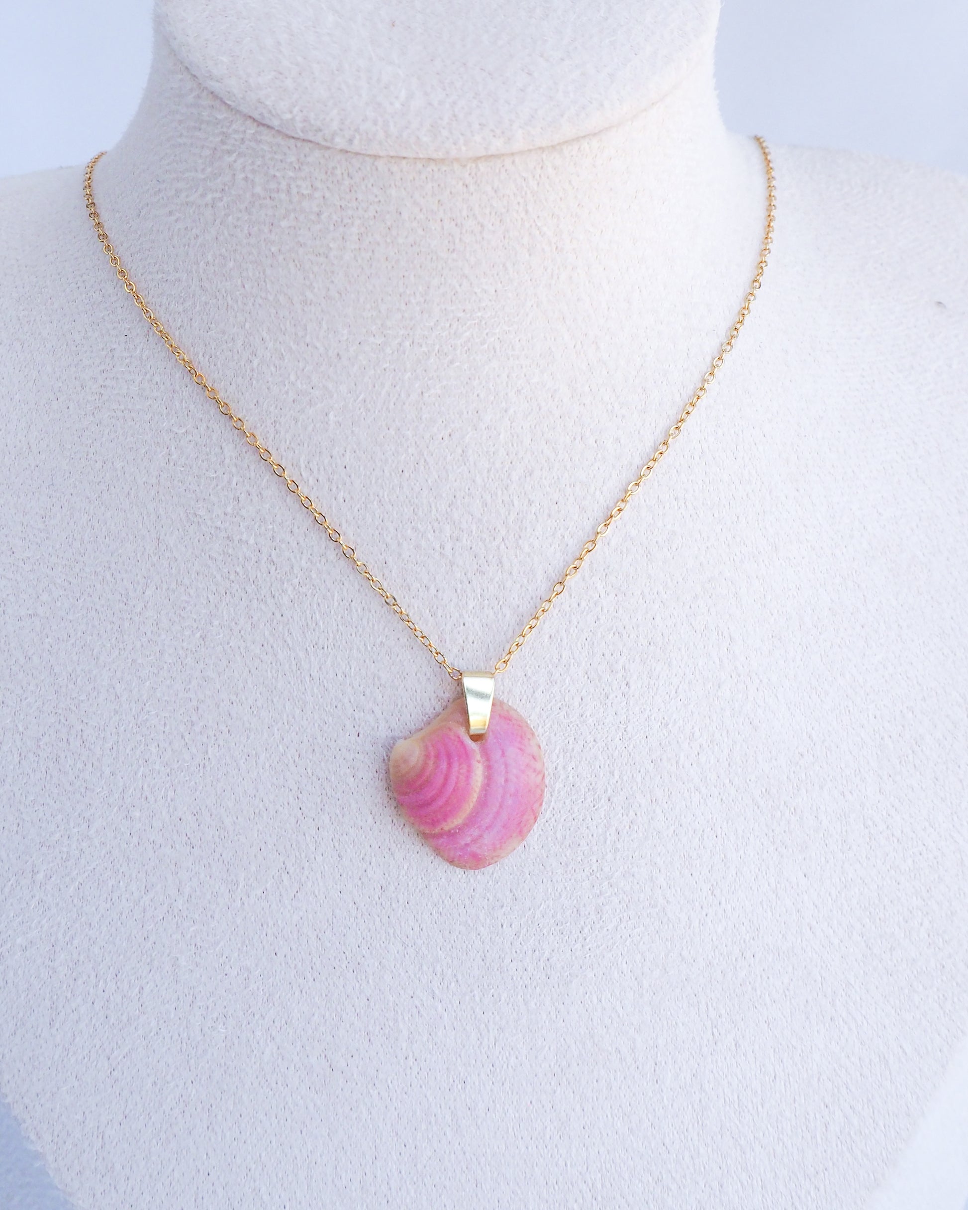 Pink Raspberry Venus Shell Necklace on neck