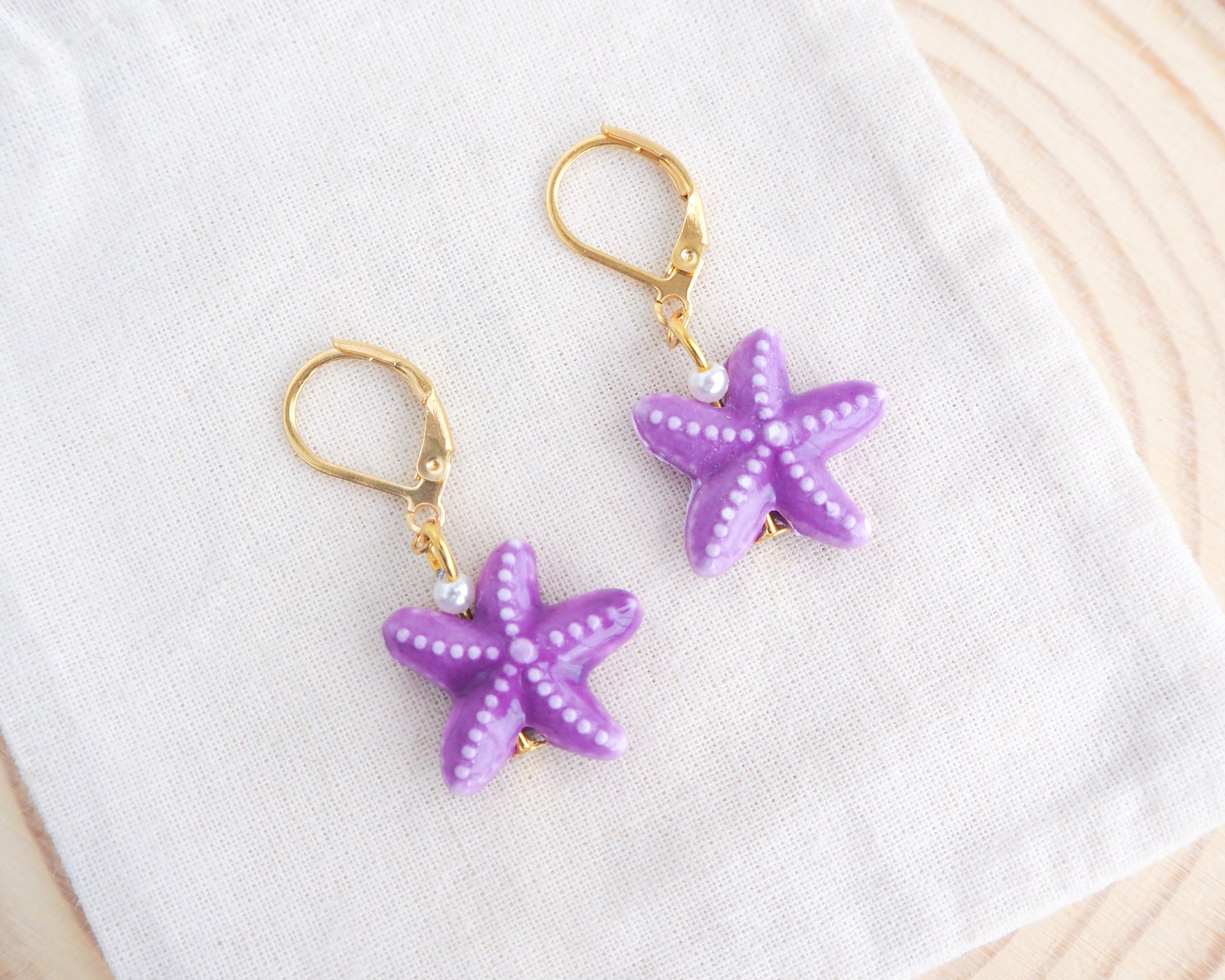 Purple Starfish Gold Earrings made of Ceramic