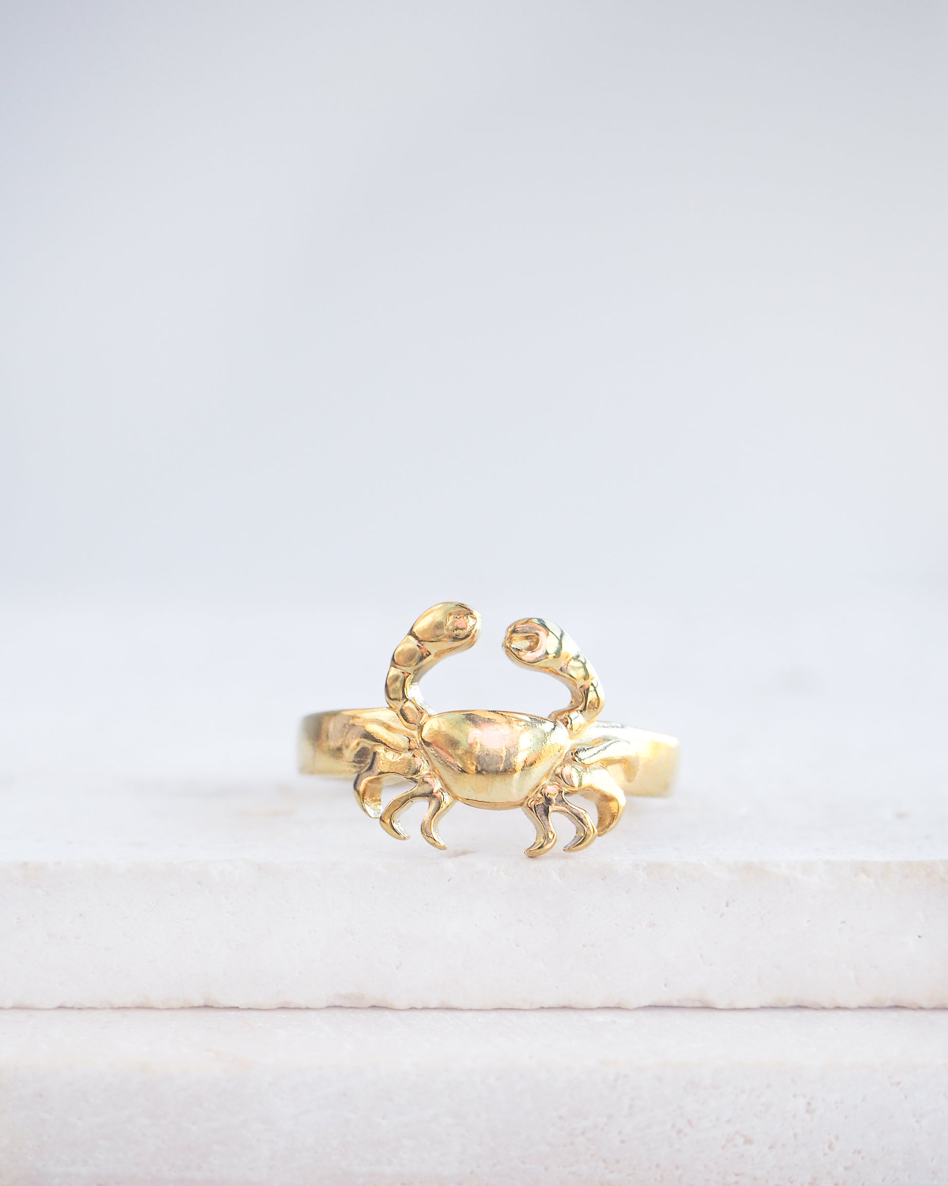 Gold Cancer Zodiac Ring on stone displayed, adjustable 18k gold stainless steel crab ring 