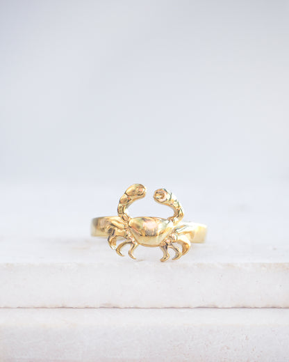 Gold Cancer Zodiac Ring on stone displayed, adjustable 18k gold stainless steel crab ring 