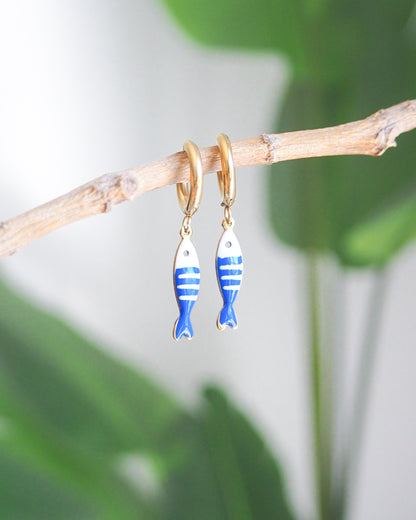 Tiny sardine fish hoop earrings with green plant background. The fish pendant is blue and white striped. Made with 18k gold stainless steel earring hoops. Beautiful gift for Portugal lovers or holiday memory, coastal jewelry from Portugal. Nautical minimalistic jewelry 