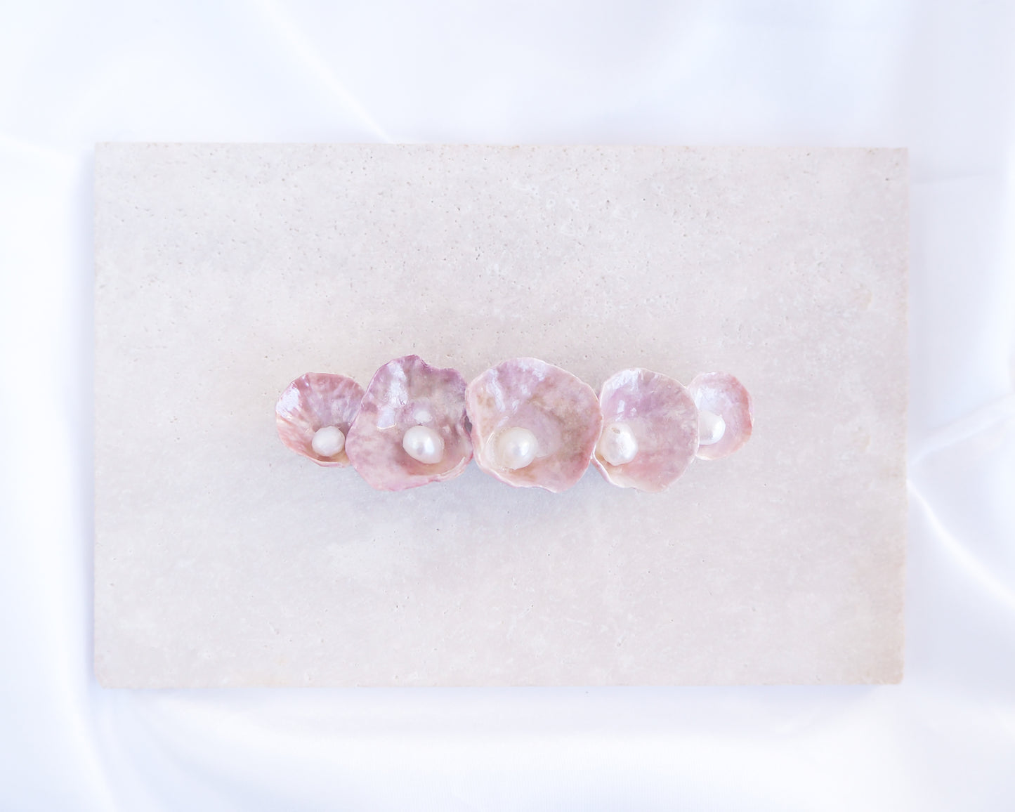 Mini Jingle Shell Pearl Hair clip II on stone displayed. Pearly shell Hair Clip Barrette made with pink fuchsia jingle shells from Portugal., Boho Seashell Beach Clip from Portugal, Handpicked Real Shells, Seashell Hair Decoration, Bohemian Seashell Wedding Hair Assocciares, Coastal Christmas gift, Beach Wedding Hair