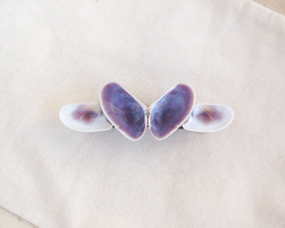 Butterfly-shaped hair clip with purple and white design on a light background. Butterfly-shaped hair clip on a beige square background. Made with purple white colored coquina shells set on a metal hair clip like a butterfly. Handpicked coquina shells from Portugal, Handpicked Real Coquina Shells, Sea Butterfly Shell Hair Decoration, Seashell Wedding Hair accessories, Coastal Christmas gift, Beach Wedding Hair