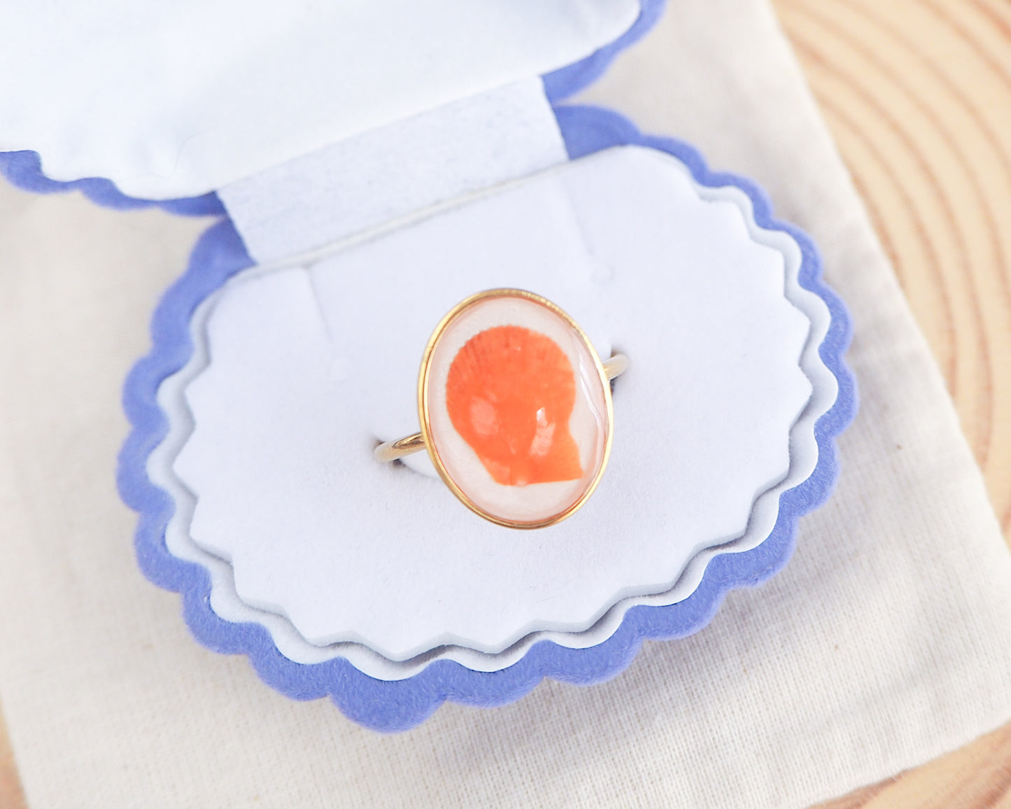 Tiny Orange Scallop Shell Gold Ring in white blue seashell jewelry box. Tiny Orange Scallop Shell Bezel Ring, 18k gold stainless steel, handpicked scallop shell from the beach of Portugal, variegated scallop shell  
