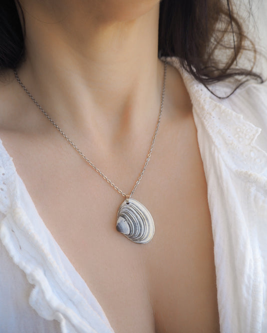 Model wearing Blue White Striped Atlantic Surfclam Shell Silver Necklace from Portugal on neck