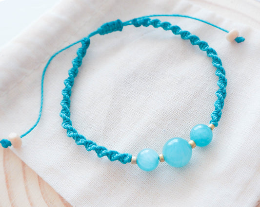 Close-up of Aquamarine Beads on Cord Bracelet, Gemstone Detail, Elegant Braided Bracelet, Calming Aquamarine