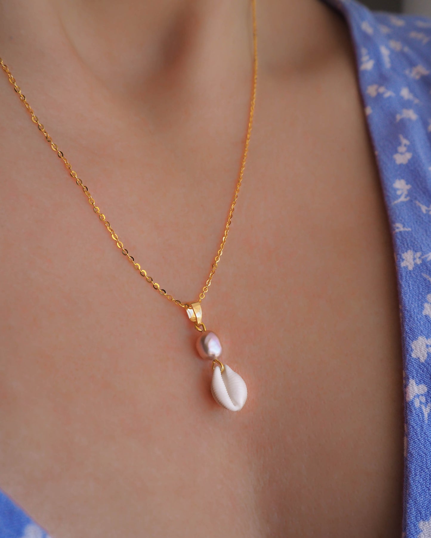 Gold Cowrie Shell Pearl Necklace, Champagne Freshwater Pearl on model