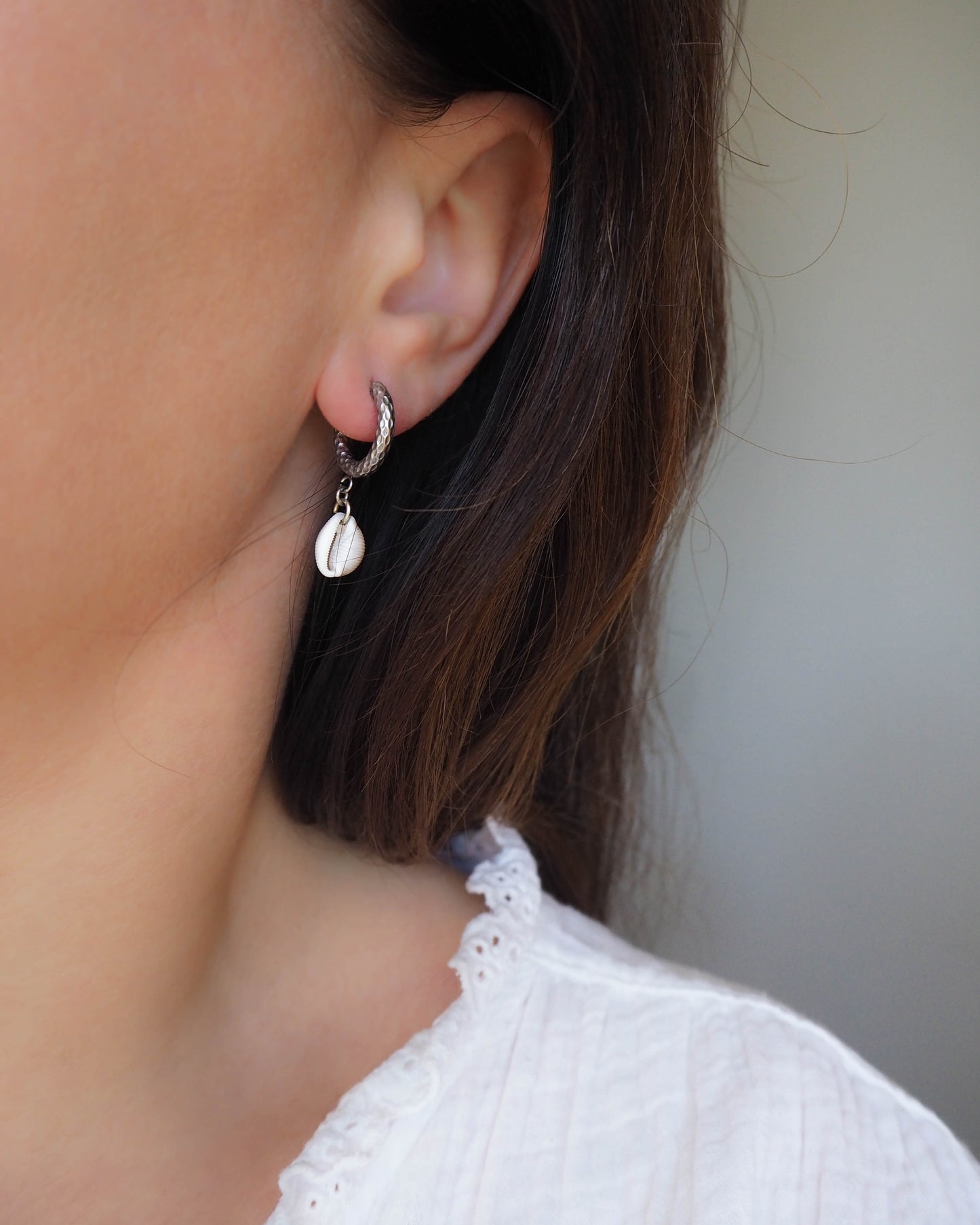 Model wearing Silver Boho Cowrie Shell Earrings – Seaside Chic Jewellery, Sea by Lou, Ocean Inspired Jewelry Portugal
