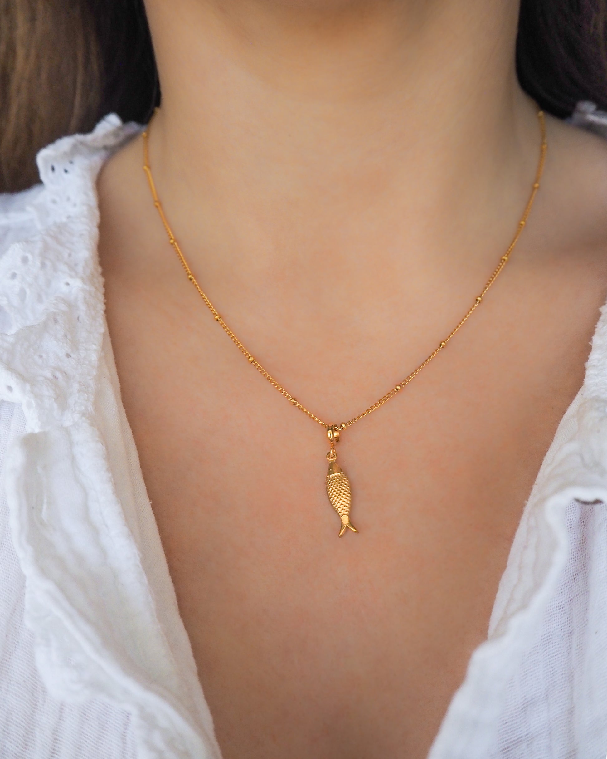 Gold Portuguese Sardine Necklace, Fish Necklace from Portugal on neck model