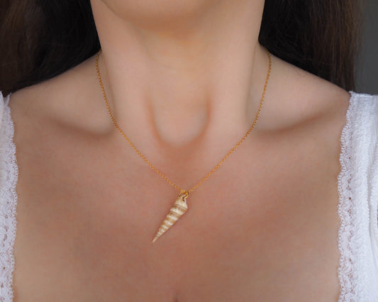 Model wearing Common Tower Shell on Gold Stainless Steel Necklace, Real Shell from Algarve