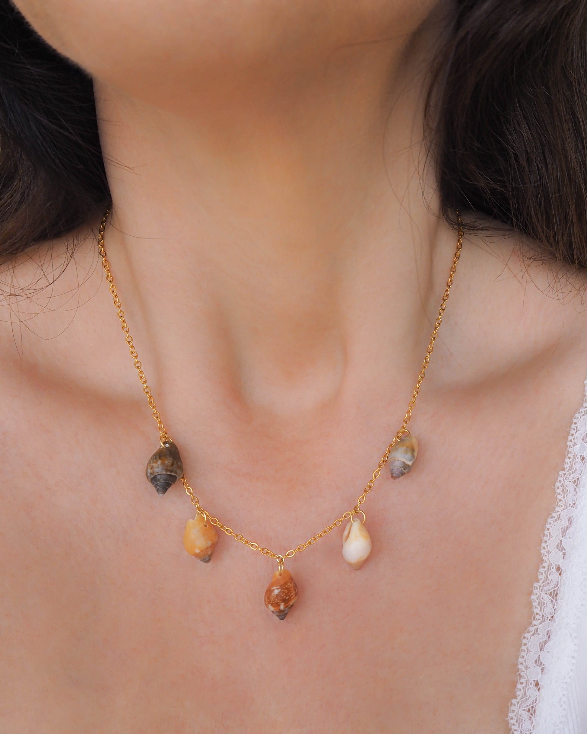 Model wearing Shell Charm Necklace with 5 Rustic Dove Shells from Portugal