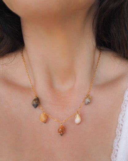 Model wearing Shell Charm Necklace with 5 Rustic Dove Shells from Portugal