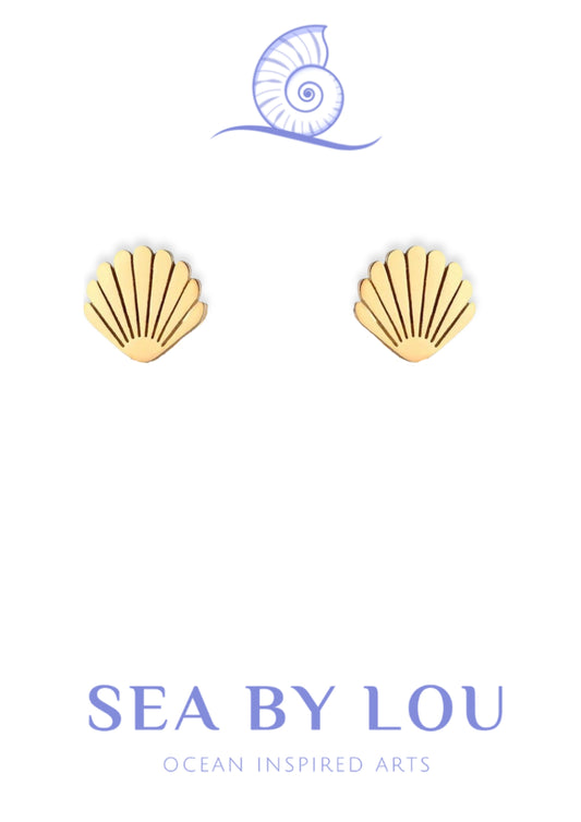 Gold Shell Stud Earrings on display with beach backdrop: Summertime Style