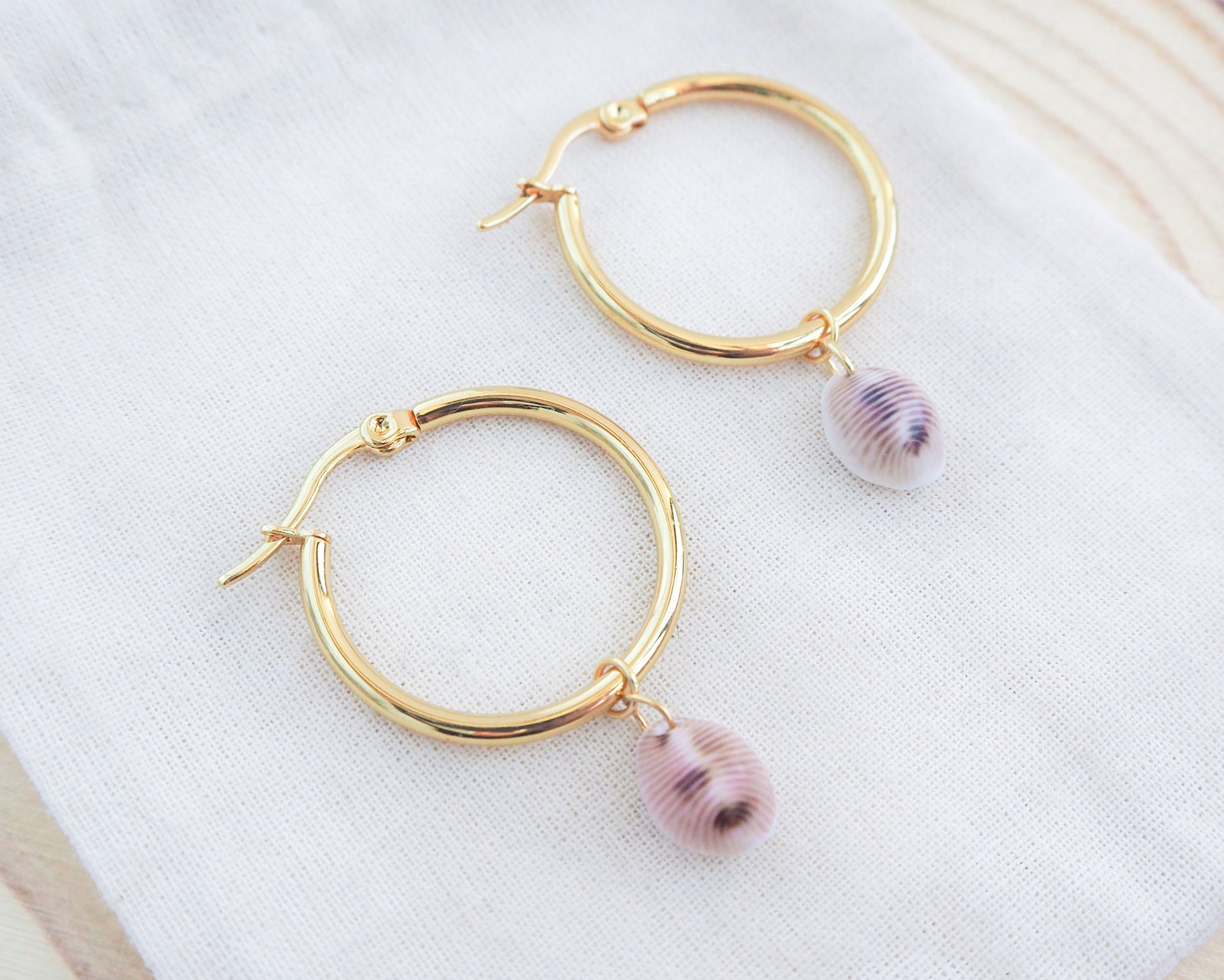 Back side of Cowrie Shell Earrings 14K Gold Plated on display. Cowrie Seashell Earrings Handmade from Portugal, Real Seashells, Cowrie shell earrings, Shell earrings, Shell hoops, Cowrie Boho earrings, Beach earrings