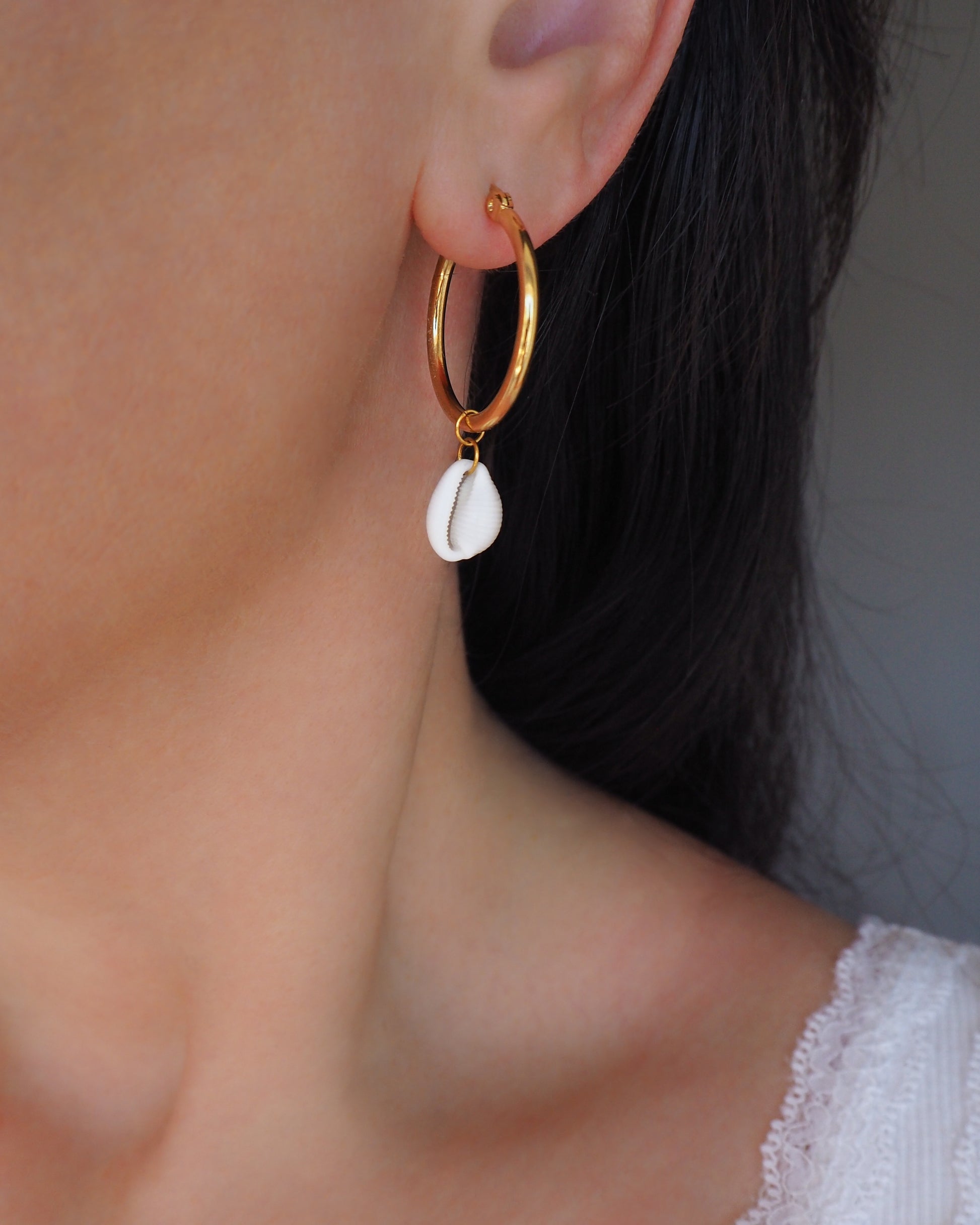 Cowrie Shell Earrings 14K Gold Plated on model. Cowrie Seashell Earrings Handmade from Portugal, Real Seashells, Cowrie shell earrings, Shell earrings, Shell hoops, Cowrie Boho earrings, Beach earrings