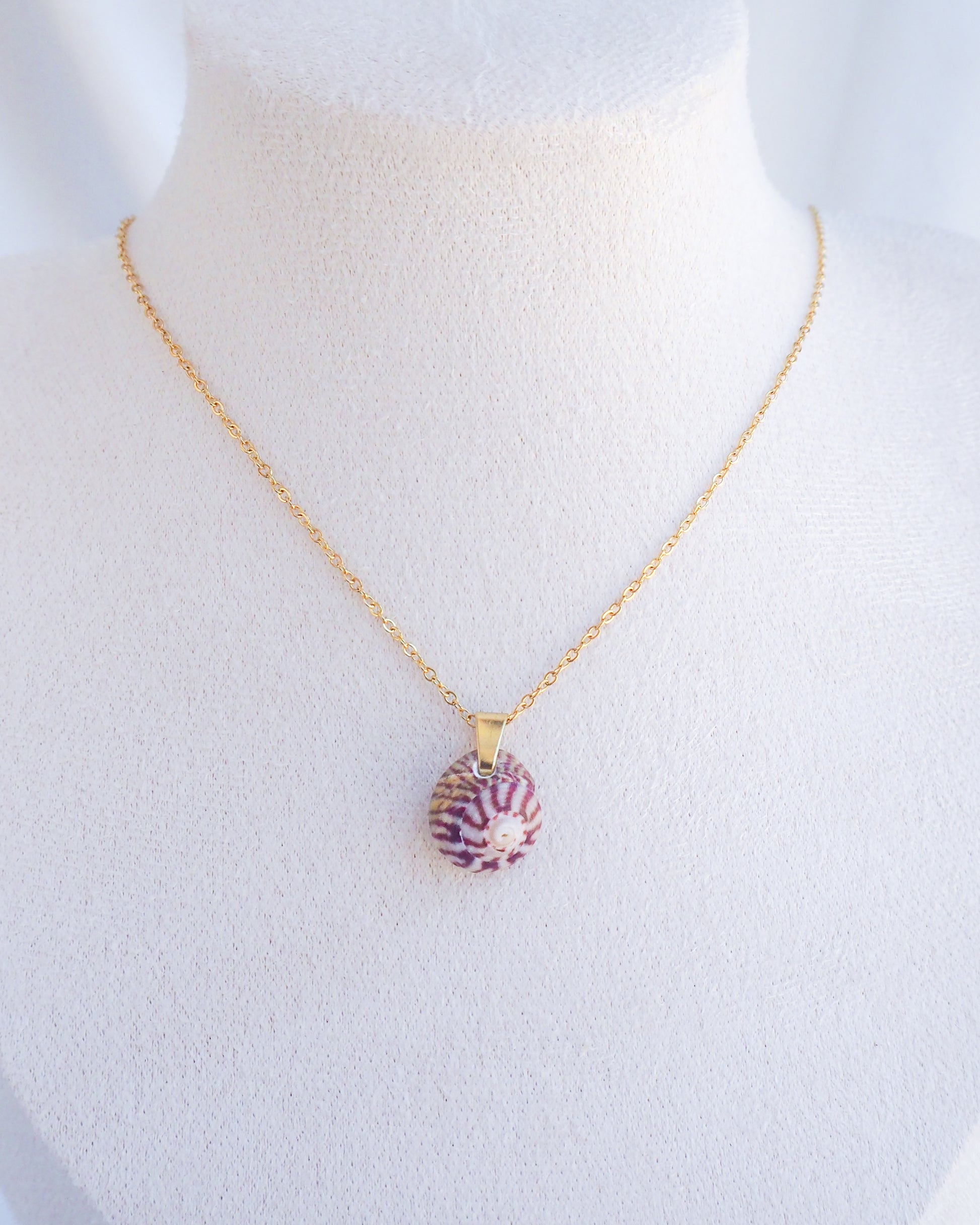 Striped Top Shell Necklace, Bordeaux red shell from portugal on model