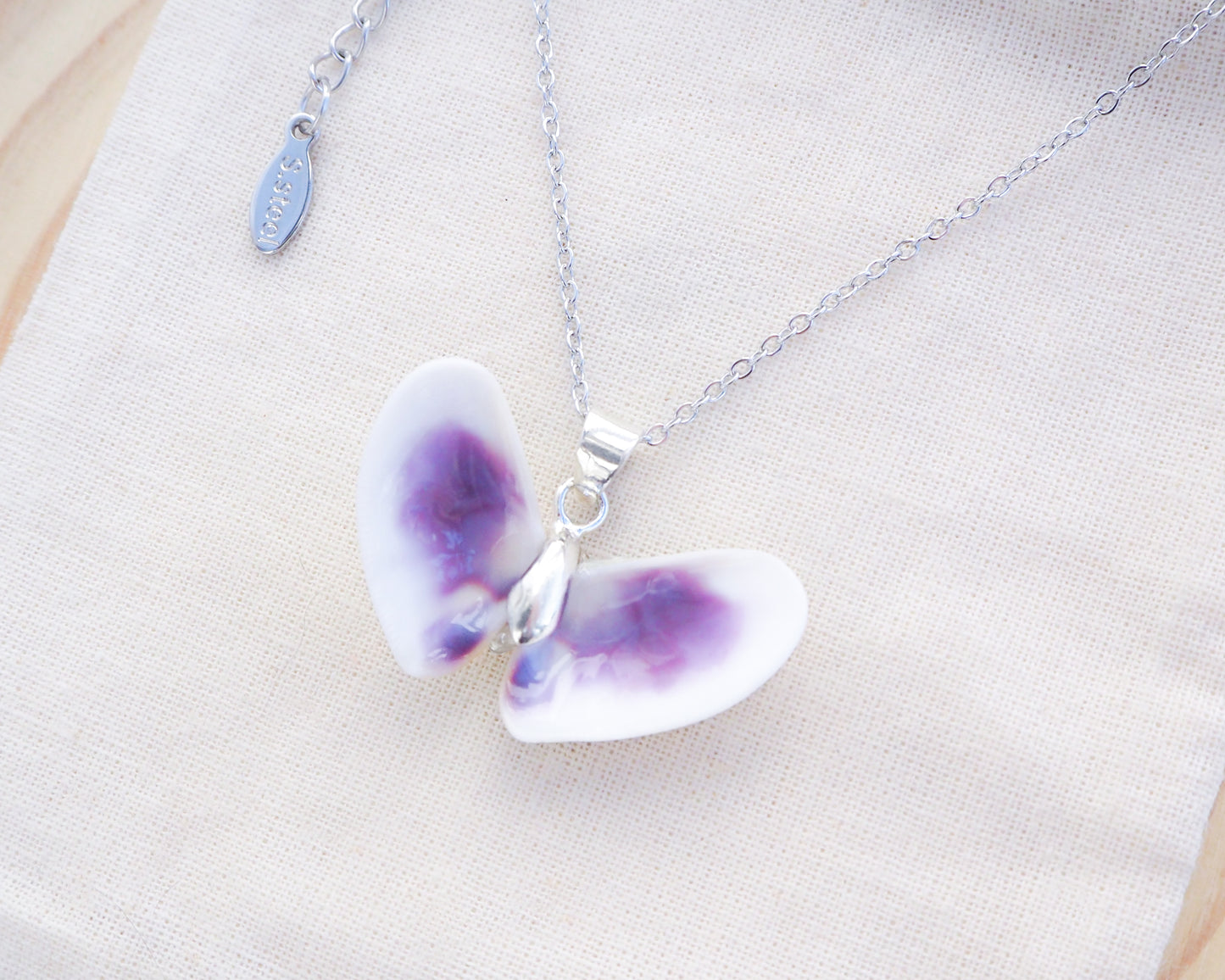 Purple Coquina Shell Butterfly Silver Necklace IV on display side view