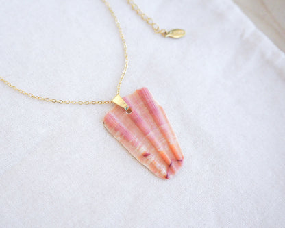 Piece of Great Scallop Shell Pendant with Gold Stainless Steel Necklace Chain on display, Sea by Lou
