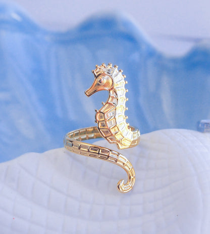 Close up of Gold seahorse ring on blue background, hippocampus ring 14k gold stainless steel