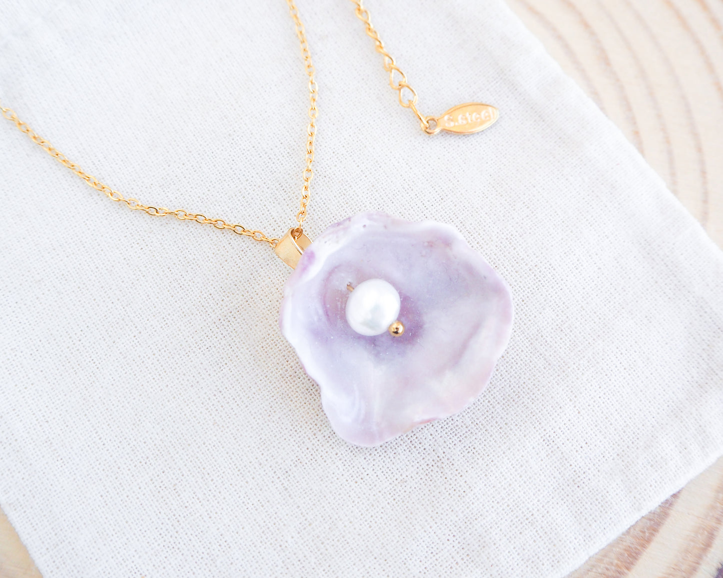 Soft Pink Pearly Shell Necklace, Gold Jingle Shell Necklace on display, Sea by Lou, Mother of Pearl Shell Portugal 