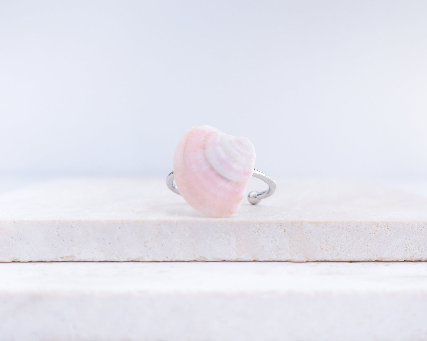 Soft Pink Venus Shell Silver Ring III on display, Pink Venus Shell from Portugal front view