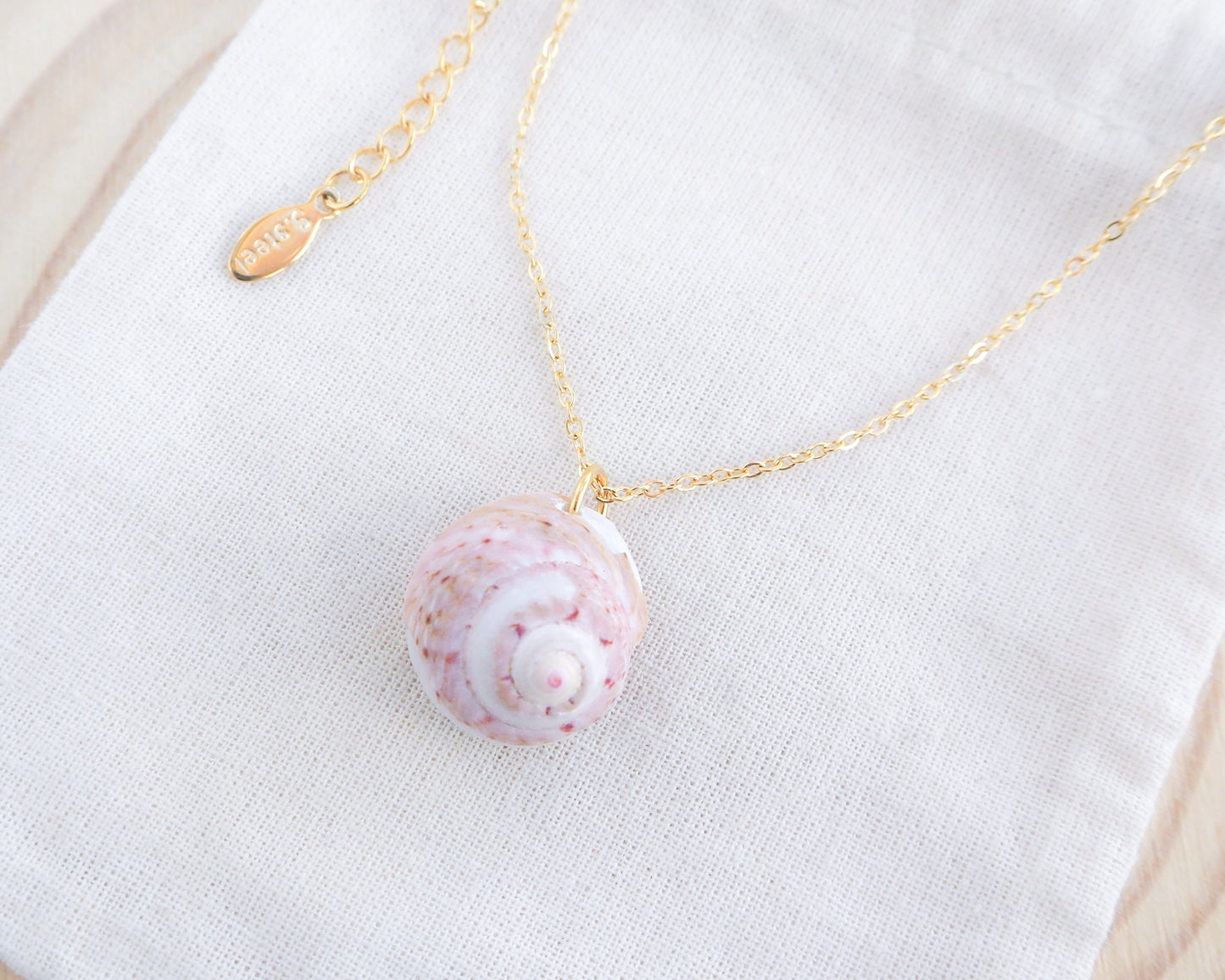 Soft Pink White Shell Gold Necklace, Pink White Magus Top Shell from Portugal on display 