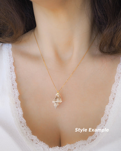 Sting Winkle Shell Necklace on neck model with white shirt and long brown hair