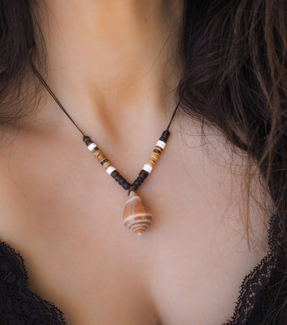 Surf Necklace with Cone Shell from Portugal on neck model. Brown Cone Shell Surf Necklace with Coconut Wooden beads  