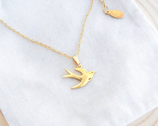 Portuguese Swallow Bird Andorinha Gold Necklace on display