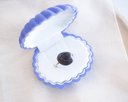 Tiny Black Venus Shell Gold Ring in blue white jewelry box. Handpicked real black venus shell from Portugal, adjustable 18k gold stainless steel shell ring