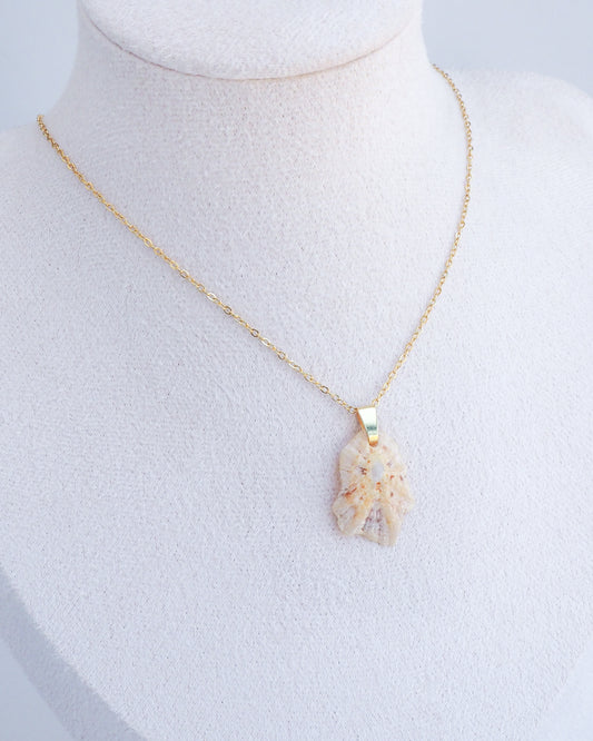 Gold Tiny Light Limpet Shell Gold Necklace on neck display
