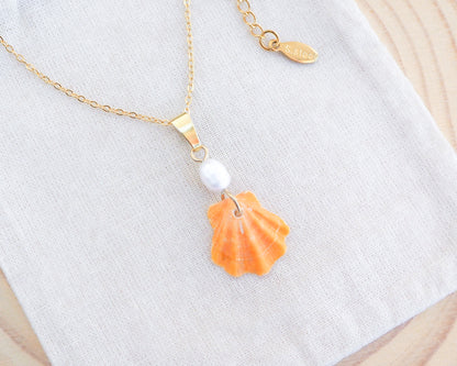 Tiny Orange Scallop Shell Pearl Gold Necklace on display, Orange Scallop Shell from Portugal, Algarve, Sea by Lou, Shell and freshwater pearl necklace