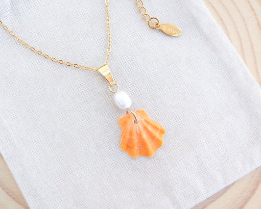 Tiny Orange Scallop Shell Pearl Gold Necklace on display, Orange Scallop Shell from Portugal, Algarve, Sea by Lou, Shell and freshwater pearl necklace