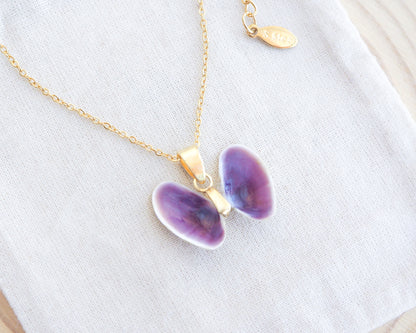 Tiny Purple Butterfly Shell Gold Necklace on display, Coquina Shells from Portugal